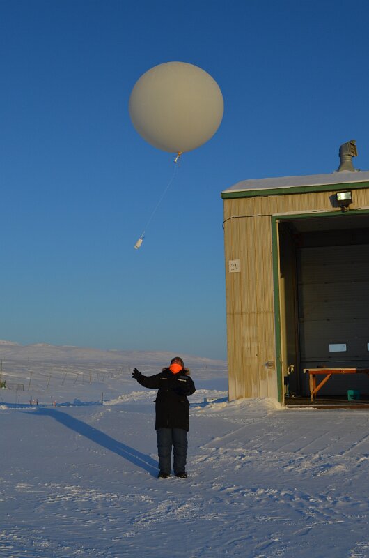 Kevin releasing a weather balloon